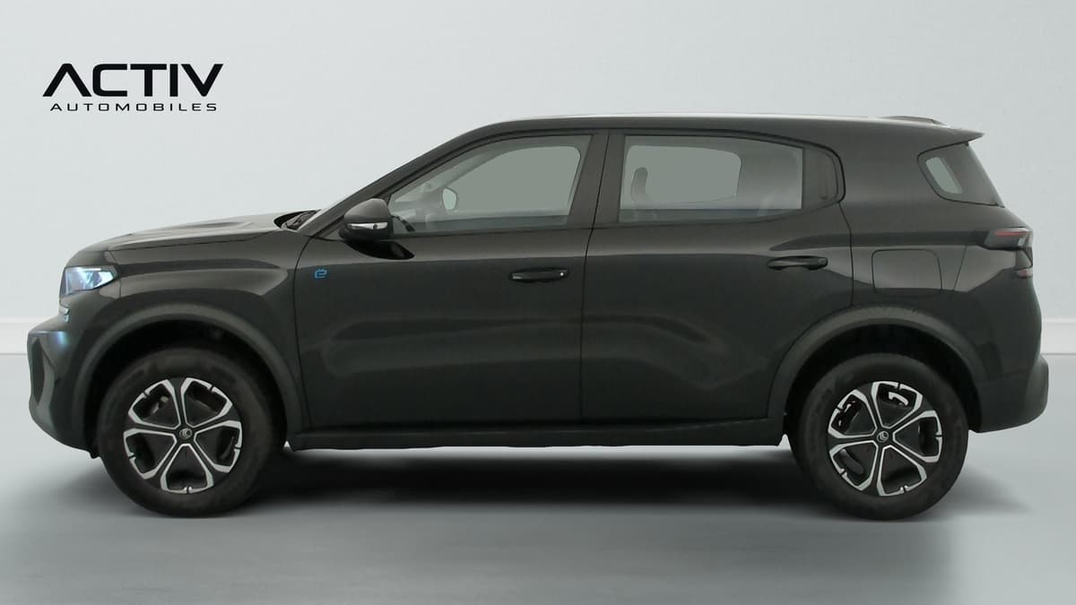 Citroën E-C3 Aircross : profil gauche du SUV noir avec jantes bicolores et poignées de portes noires
