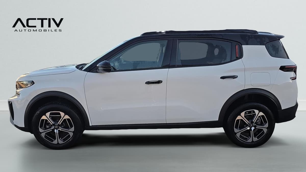 Citroën C3 Aircross : profil gauche du SUV blanc à toit noir avec jantes alliage bicolores