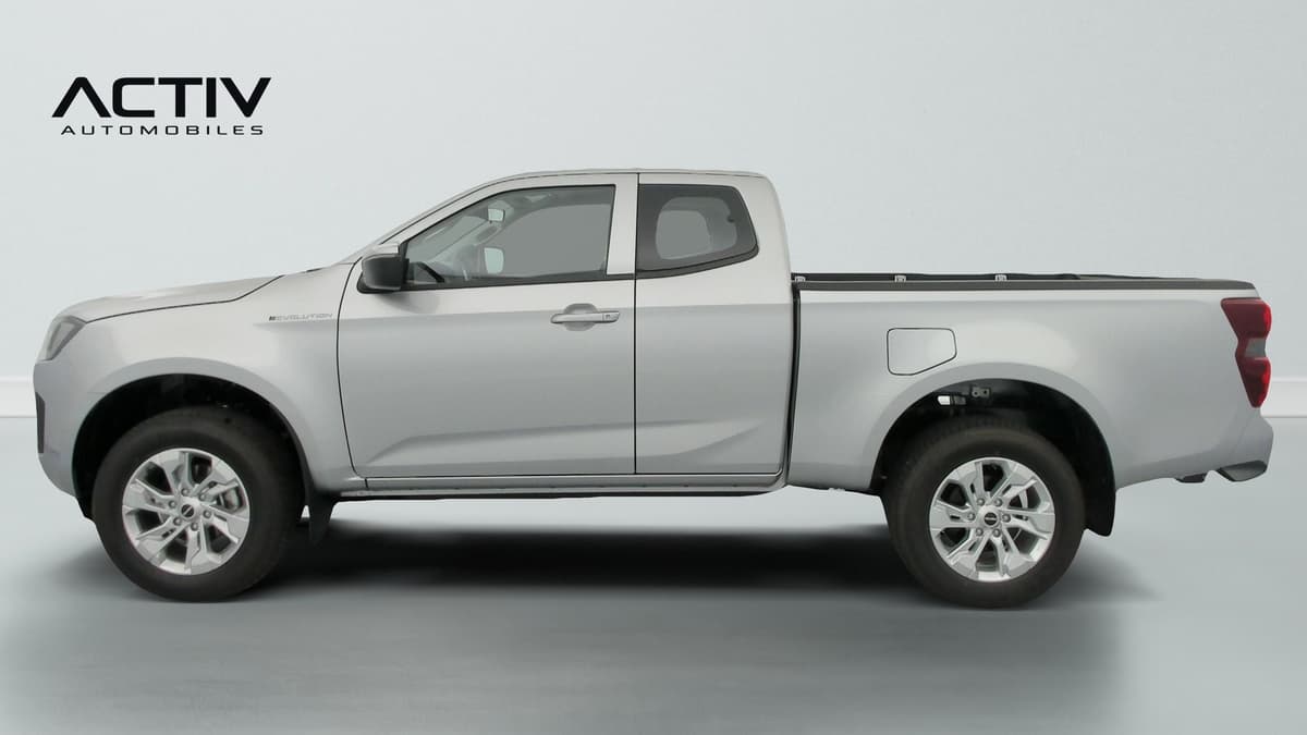 Isuzu D-MAX : profil gauche du pick-up gris avec jantes alliage et rétroviseur