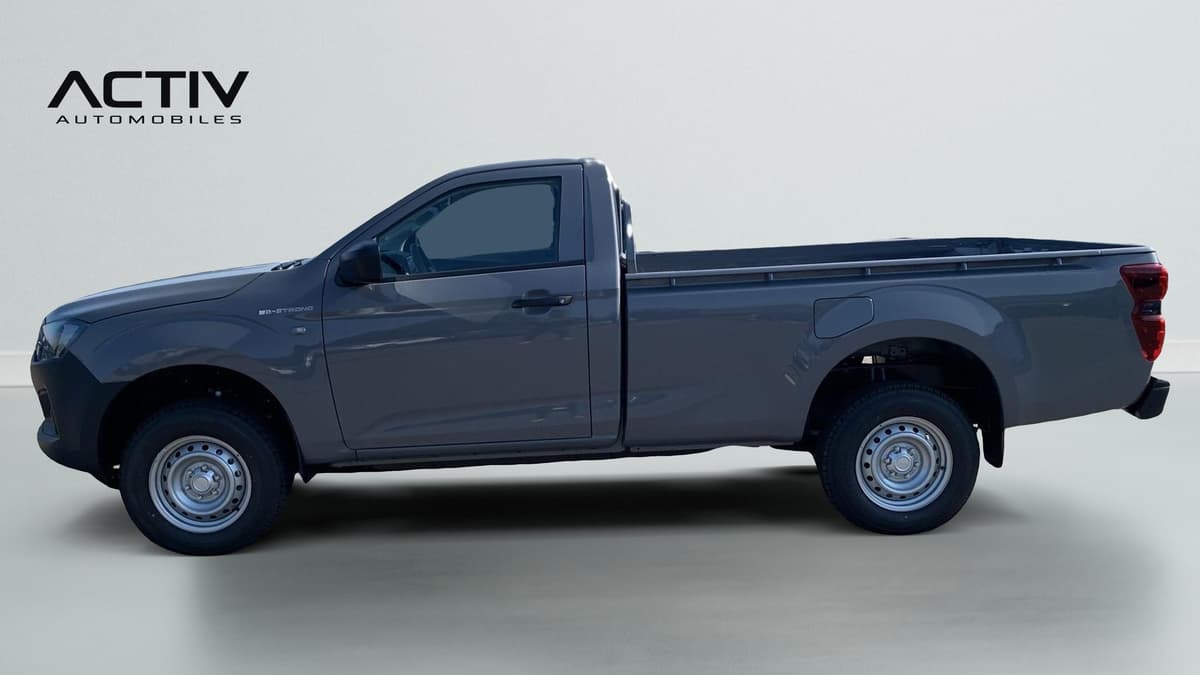 Isuzu D-MAX : profil gauche du pick-up gris avec cabine simple et plateau ouvert