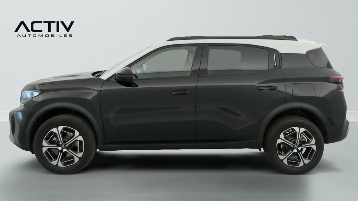 Citroën C3 Aircross : profil gauche du SUV noir à toit blanc avec jantes alliage diamantées