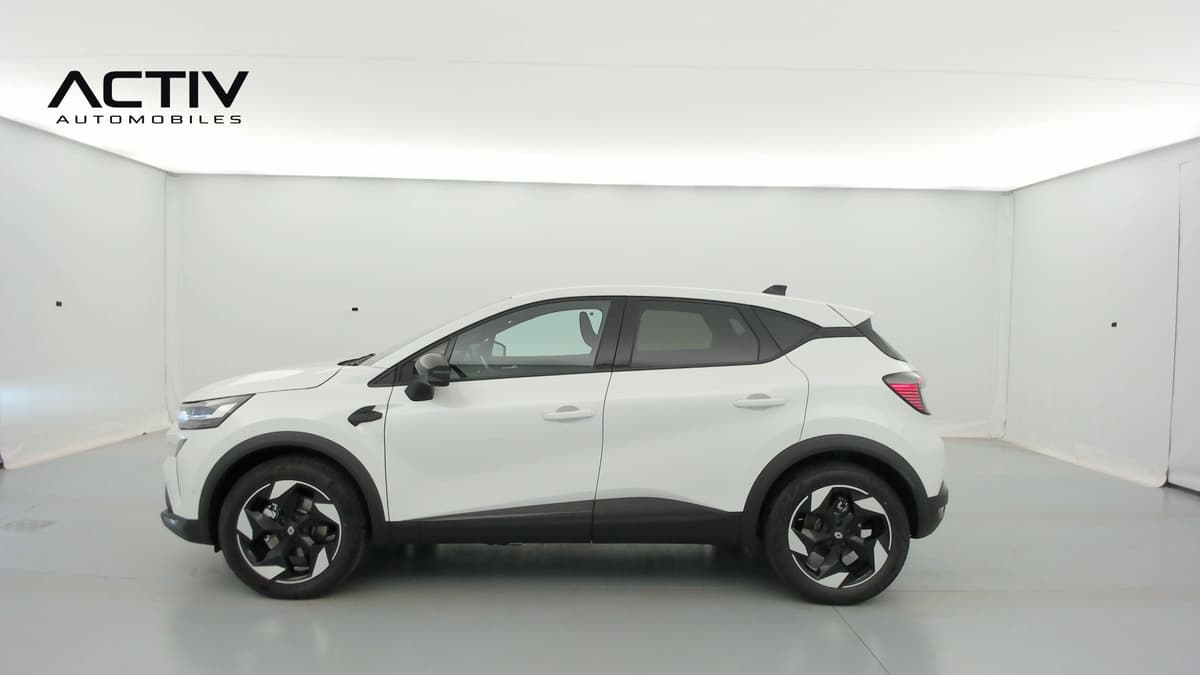 Renault Captur : profil gauche du SUV blanc avec jantes aluminium noires et blanches