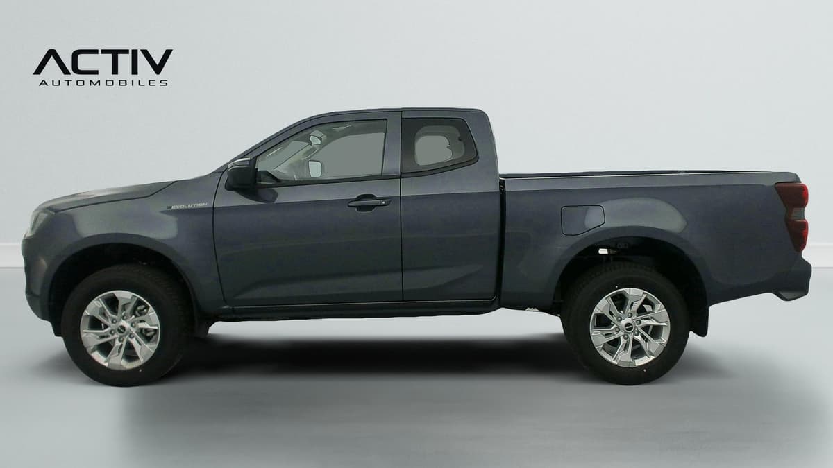 Isuzu D-MAX : profil gauche du pick-up gris avec jantes alliage et plateau arrière