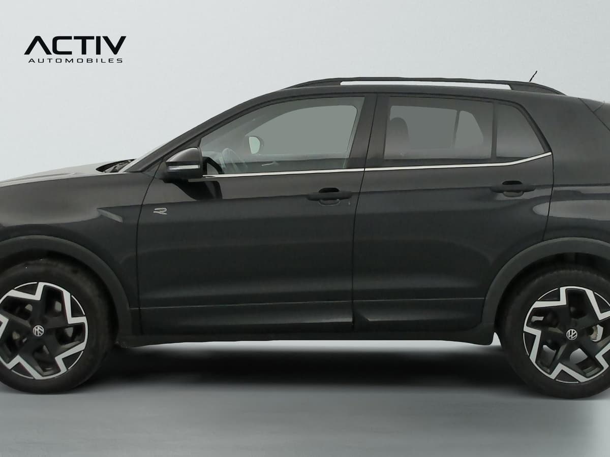 Volkswagen T-cross : profil gauche noir avec jantes alliage bicolores et rampes de pavillon