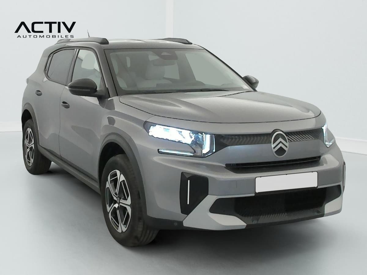 Citroën C3 Aircross : vue avant trois quarts droit d'un SUV gris à toit noir et jantes bicolores