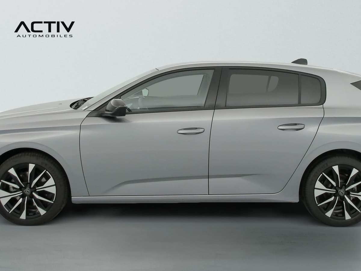 Peugeot 308 Nouvelle : profil gauche de la berline grise avec jantes alliage bi-tons