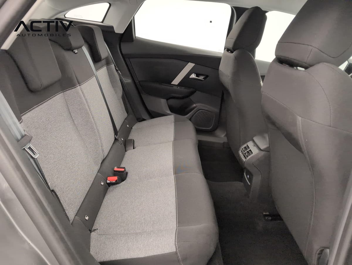 Citroën C4 : banquette arrière en tissu gris et noir vue depuis la portière gauche