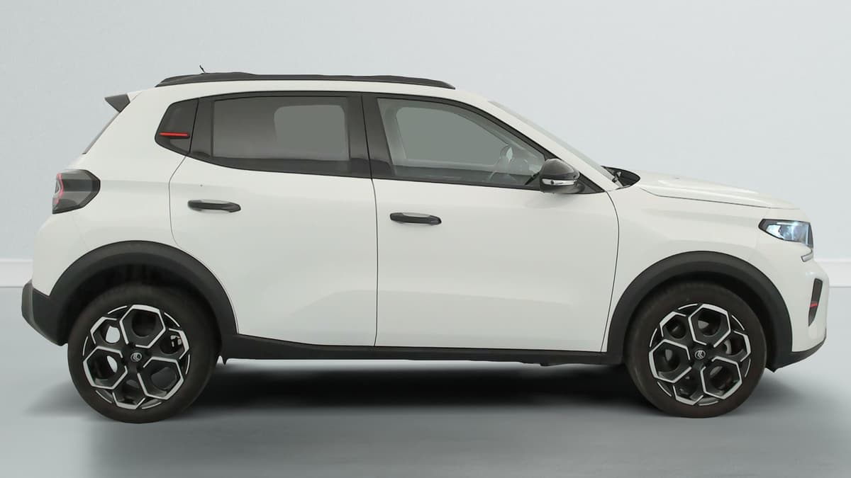 Citroën C3 : profil droit blanc avec jantes alliage diamantées et toit noir