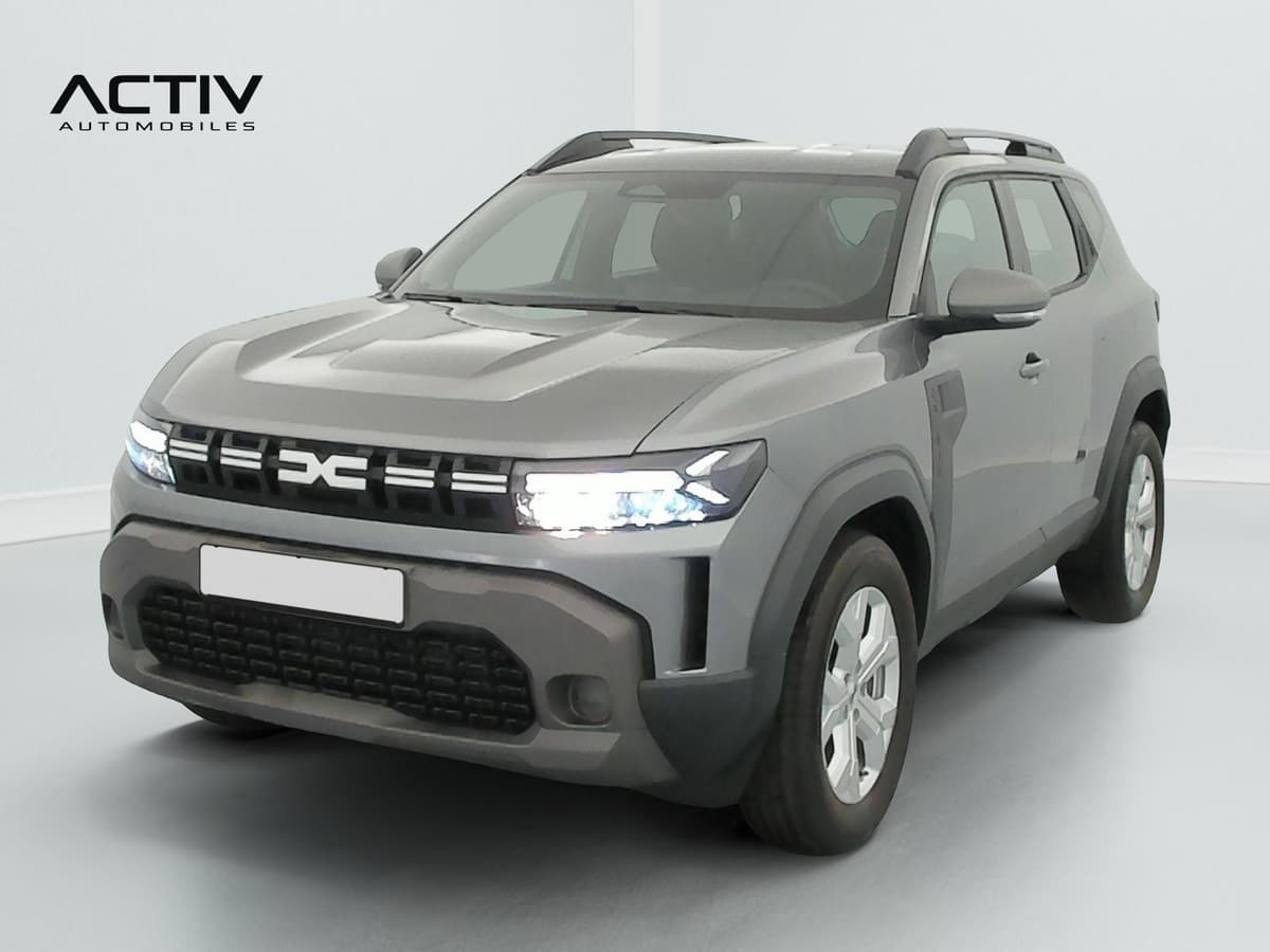 Dacia Duster : vue avant trois quarts gauche avec barres de toit et feux allumés