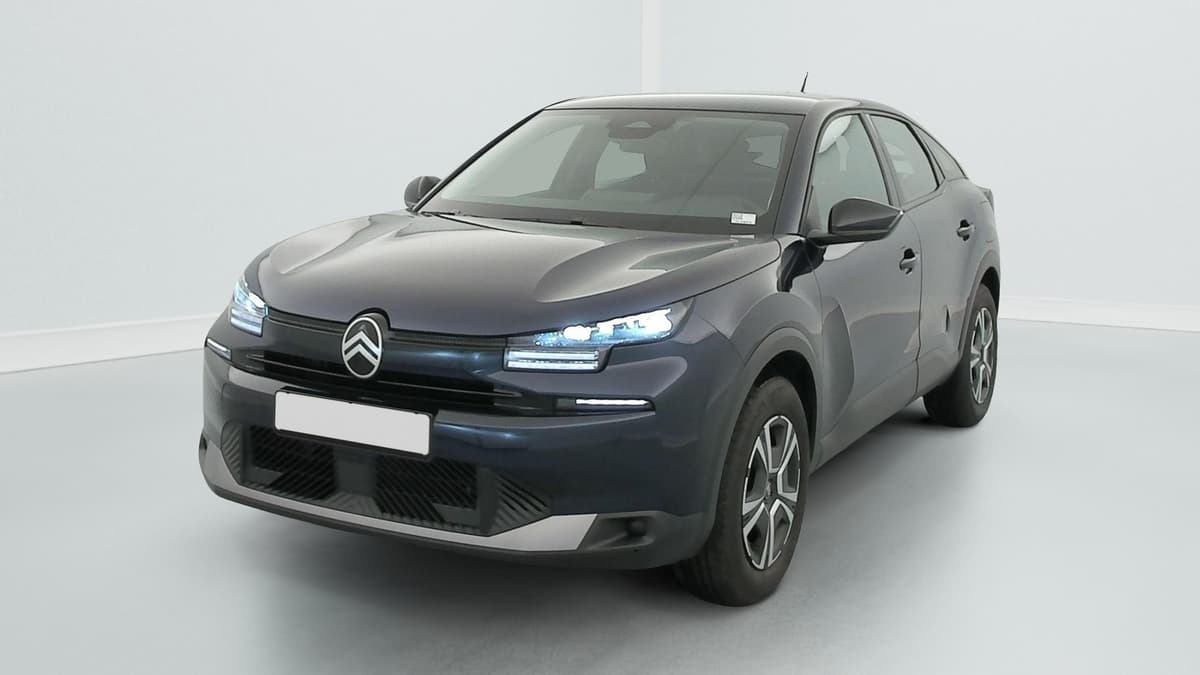 Citroën C4 : vue avant trois quarts droit, bleu foncé, projecteurs LED allumés et enjoliveurs